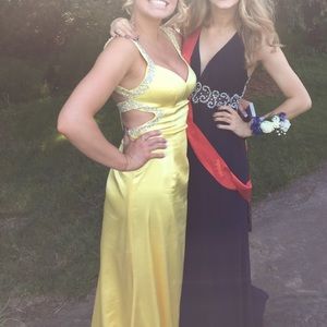 Recently dry cleaned yellow silk prom dress
